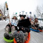 sledding-down-main-street-at-ullr-fest-in-breckenridge-1024×747